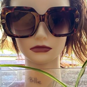 Gucci oversized sunglasses.